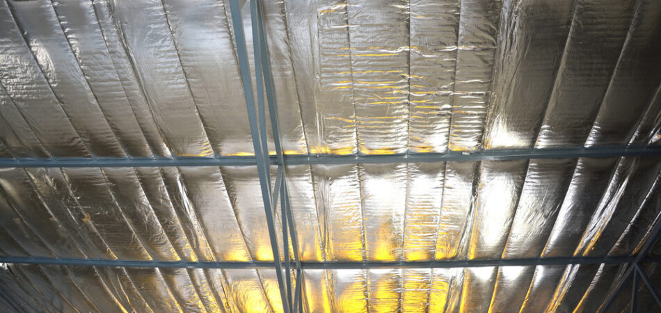 Insulation,sheet,placed,under,metal,frame,roof,for,heat,protection.